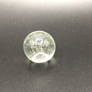 Single clear 1" art glass shooter marble bubble -has defect in glass